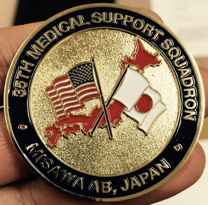 Side 2, medallion for a medical support squadron in Misawa AB, Japan